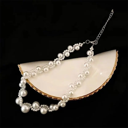 Necklace of small and large freshwater pearls