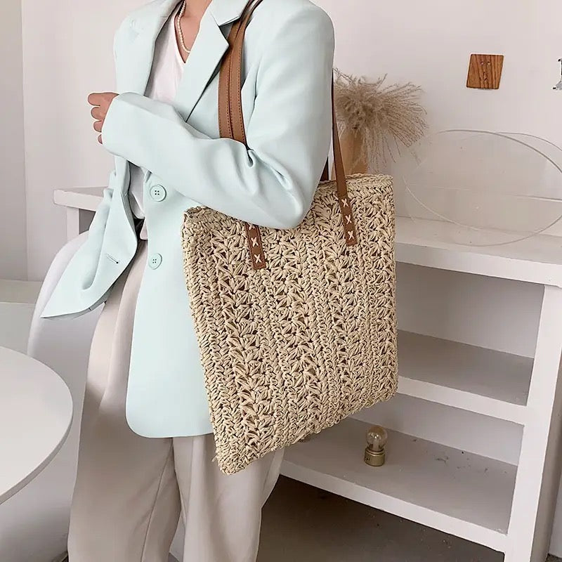 Rattan palm bag with leather straps