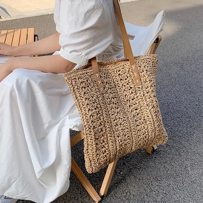 Rattan palm bag with leather straps